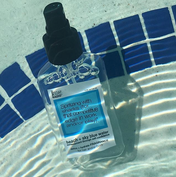 Spritzing with sharks (for that competitive edge in work and/or play). <b>fragrance</b>