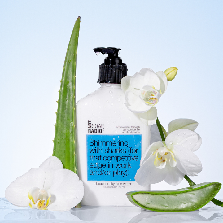 Shimmering with sharks (for that competitive edge in work and/or play). <b>hand/body lotion</b>