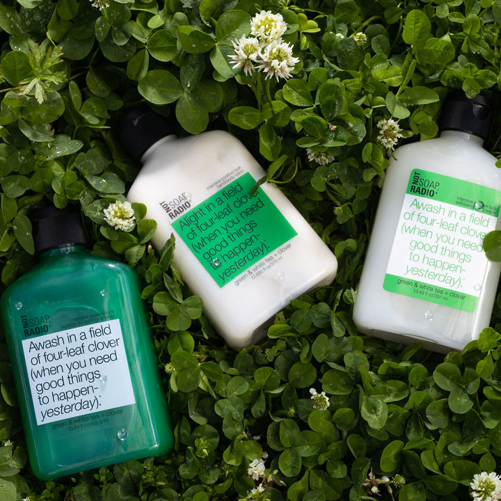 Trio: Awash in a field of four-leaf clover: bubbles for bath/shower, hand/body lotion and exfoliating body wash