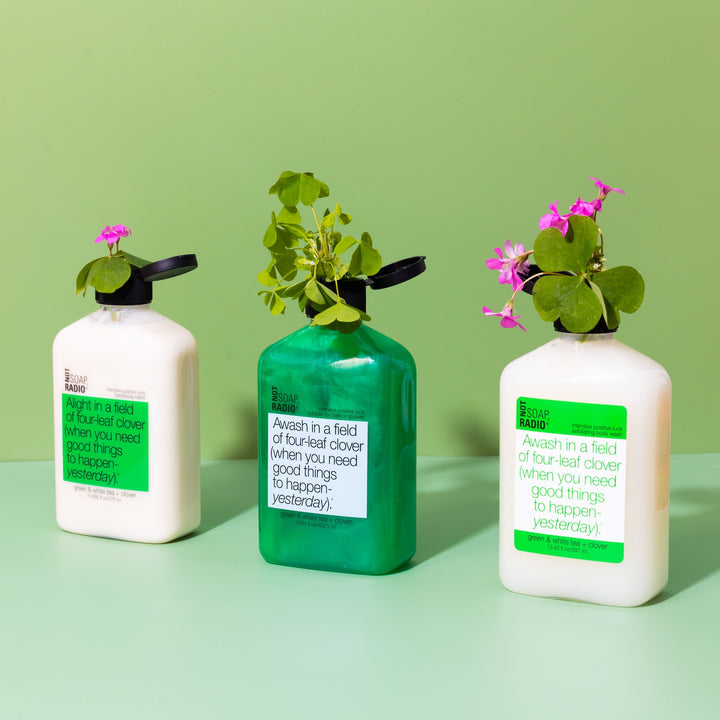 Trio: Awash in a field of four-leaf clover: bubbles for bath/shower, hand/body lotion and exfoliating body wash