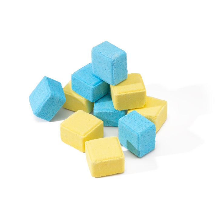 Ten shower steamers arranged in a pyramid, Showing the full aromatherapy 10-pack shower steamer set.  Half are When life gives you one too many lemons and half are bathing with sharks.