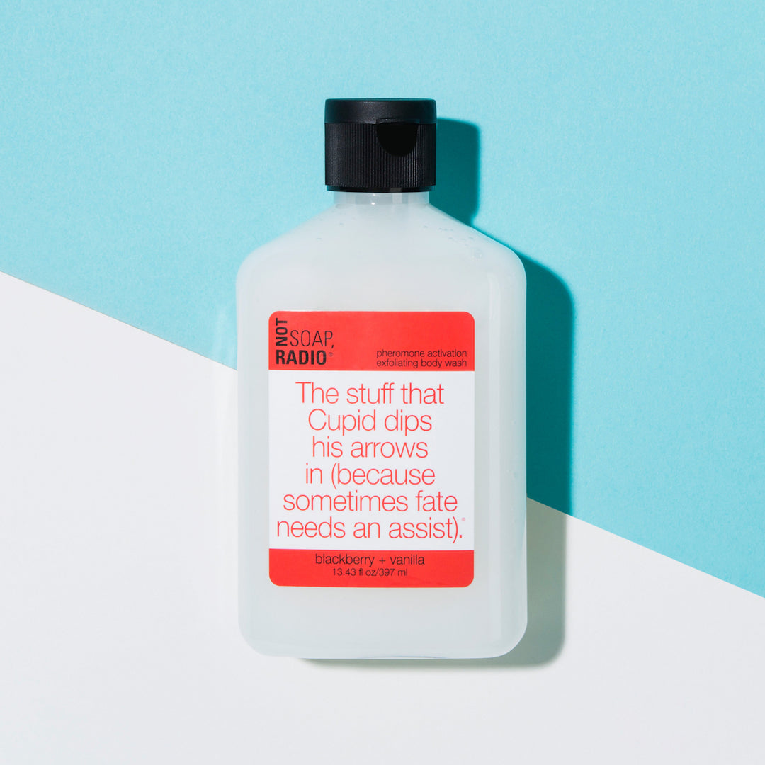blackberry vanilla scented pheromone activation exfoliating body wash on a blue/white background