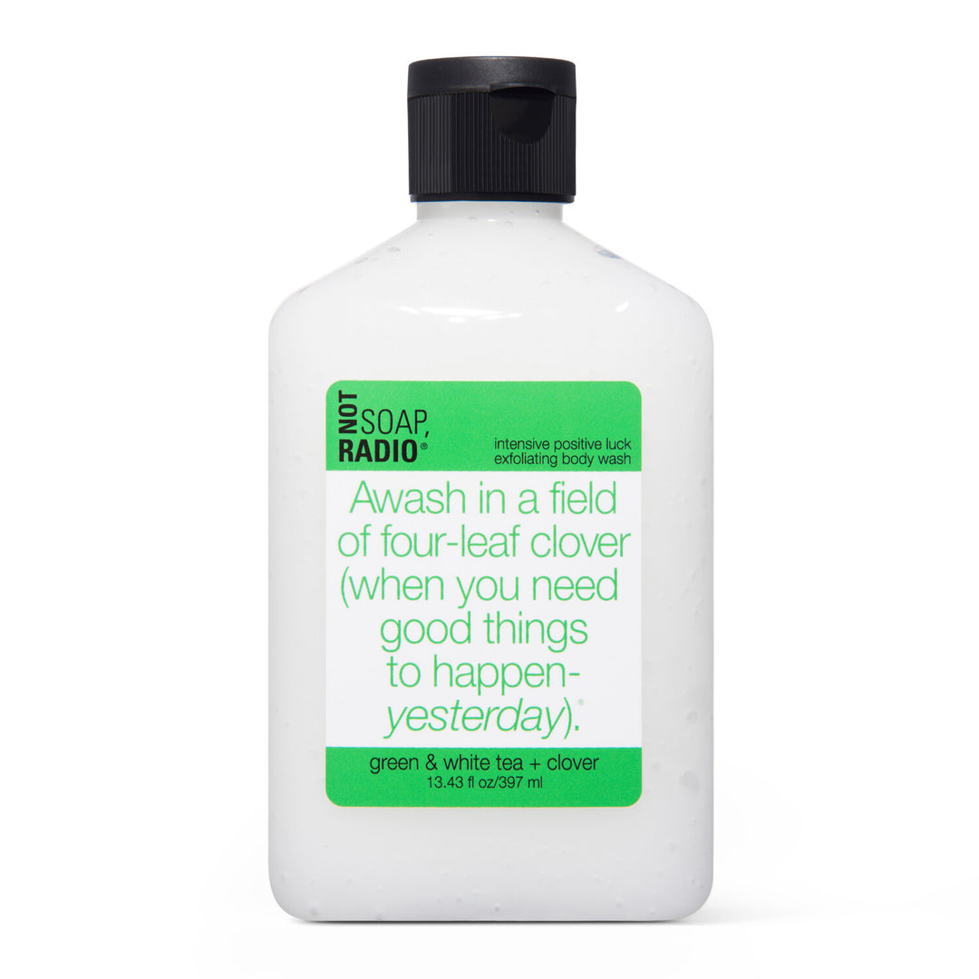 Not Soap Radio's "Awash in a field of four-leaf clover" exfoliating body wash, on a white background