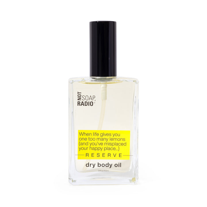 Lemons Reserve concentrated dry body perfume bottle on white background