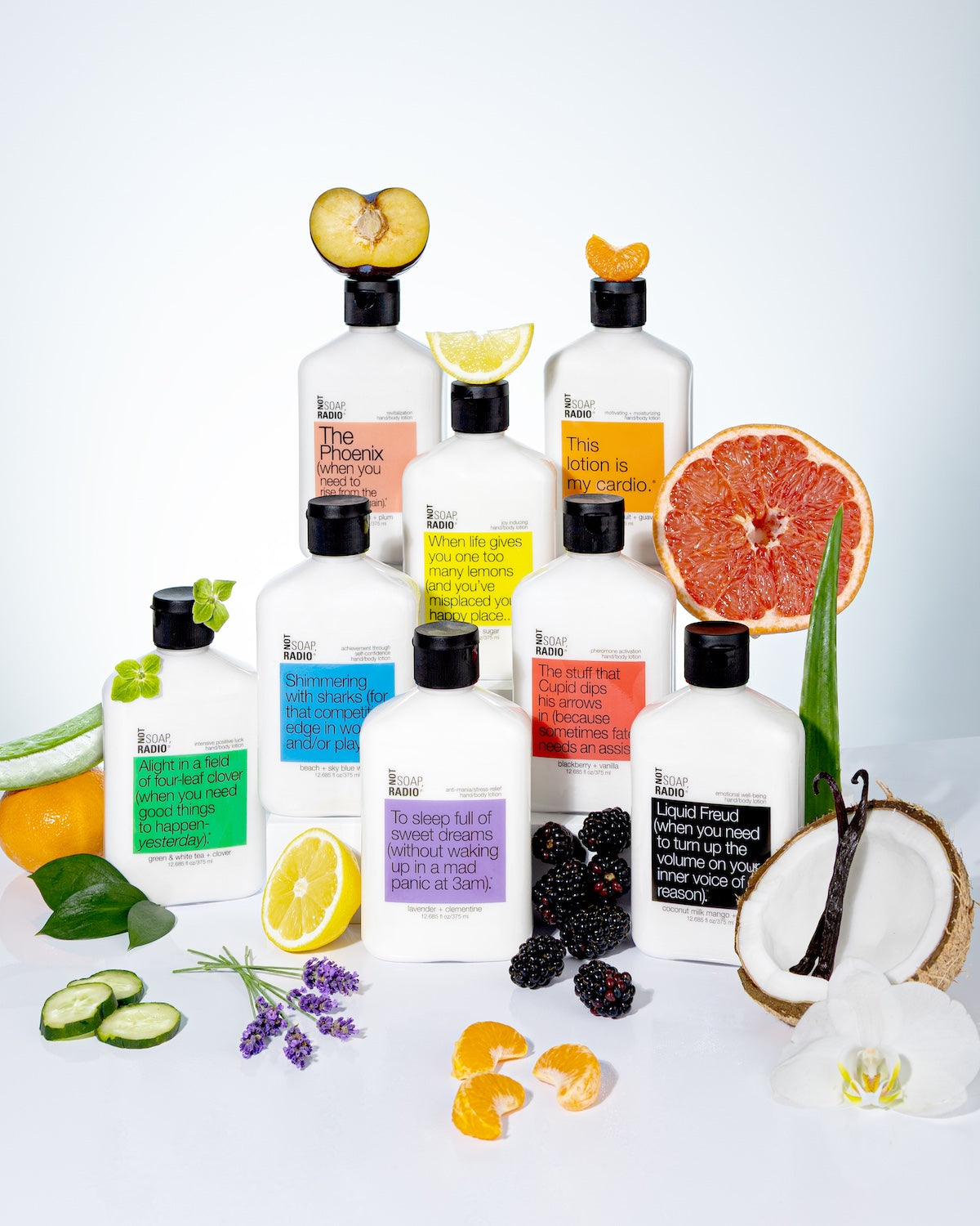8 bottles of natural aromatherapy lotion in the form of a pyramid with botanical fruit ingredients
