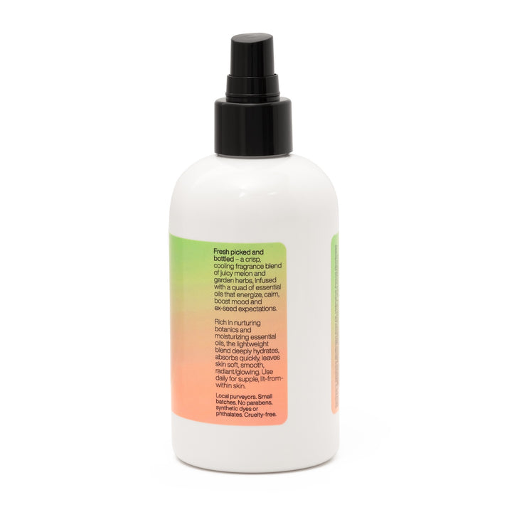 Side of watermelon basil mint scented Farm to Bottle body oil with product description, including focus on local purveyors, small batches. No parabens, synthetic dyes or phthalates. Cruelty-free.