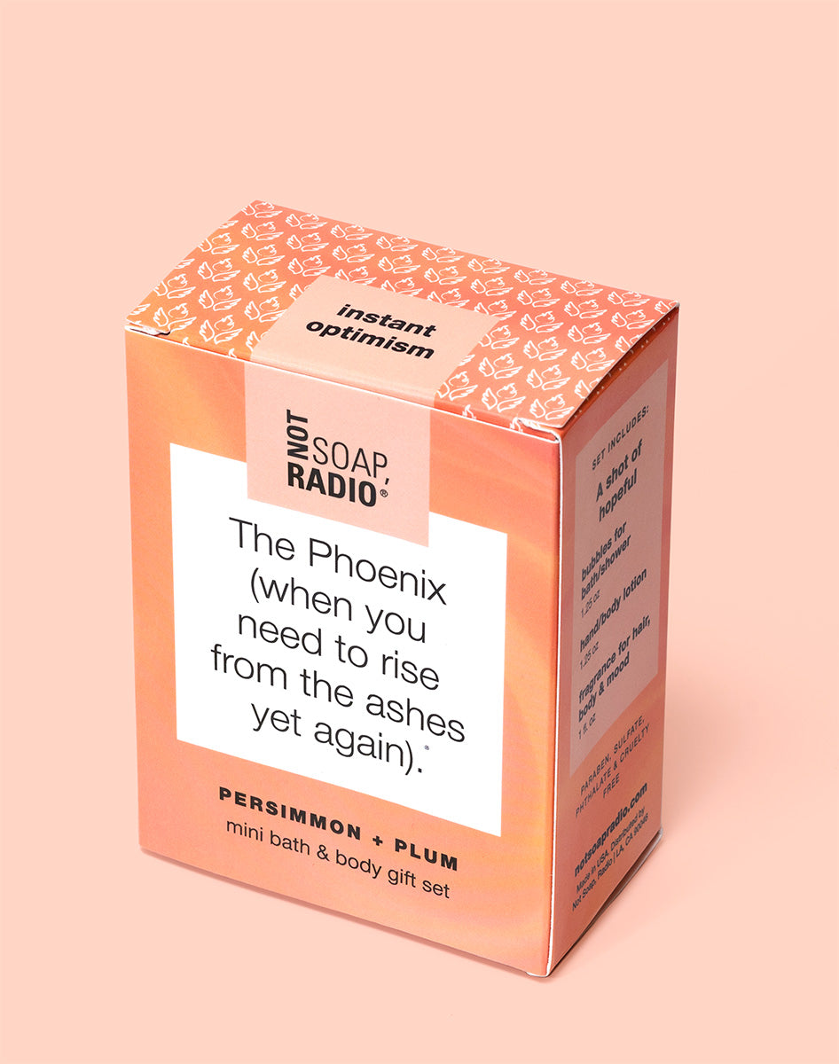 The phoenix mini bath and body gift box, on a pink background