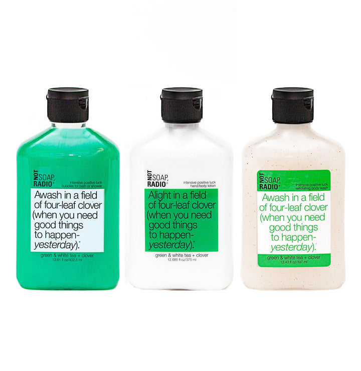 Trio: Awash in a field of four-leaf clover: bubbles for bath/shower, hand/body lotion and exfoliating body wash - Not Soap Radio Trio